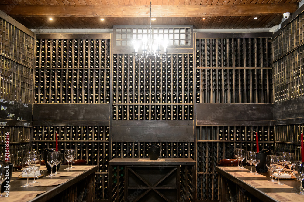 The wine room with a lot of buttles The wine room with a lot of buttles