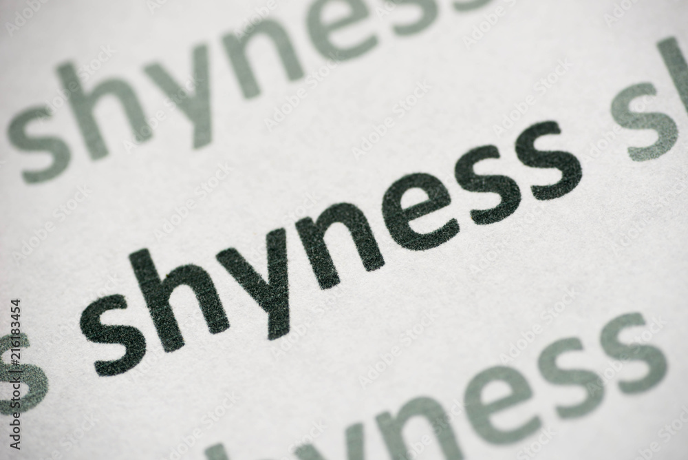 word shyness printed on paper macro