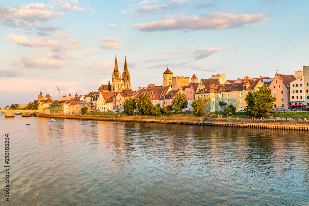 Regensburg city, Germany. View from Danube river, Regensburg Cathedral and Stone Bridge on background