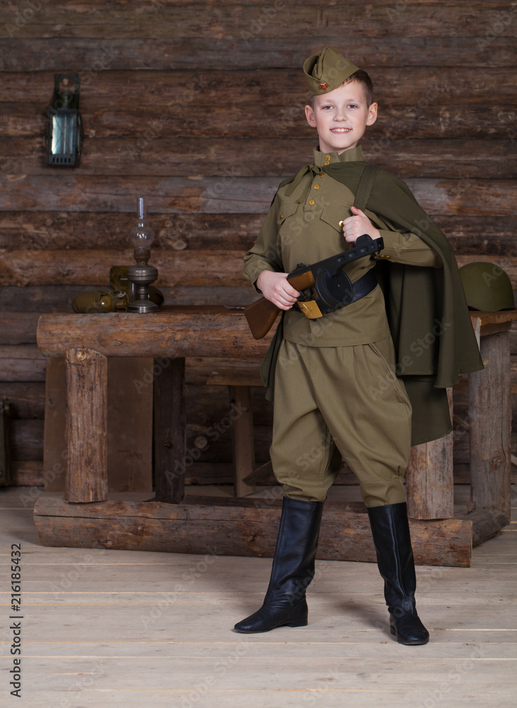 Russian boy in the old-fashioned Soviet military uniform Stock Photo |  Adobe Stock