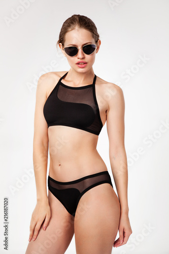Beautiful woman in black bikini © Amelia Fox