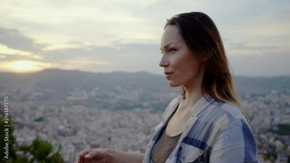 Beautiful woman enjoying Barcelona city view from Bunkers del Carmel, Spain Beautiful woman enjoying Barcelona city view from Bunkers del Carmel, Spain