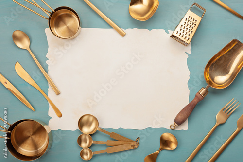 Flat lay with kitchen utensils and blank copy space. Kitchen recipe books, cooking blogs, classes concept