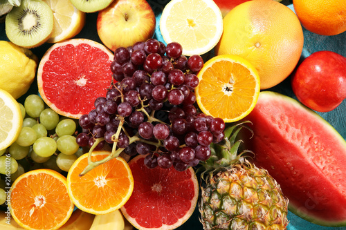 Fresh organic fruits background. Healthy eating concept.