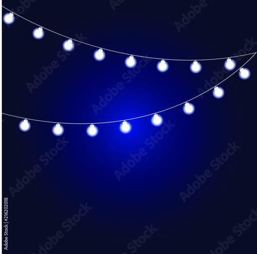 Christmas fairy light bulbs on a blue background