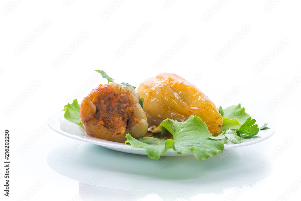 stewed in tomato sauce stuffed peppers in a plate stewed in tomato sauce stuffed peppers in a plate