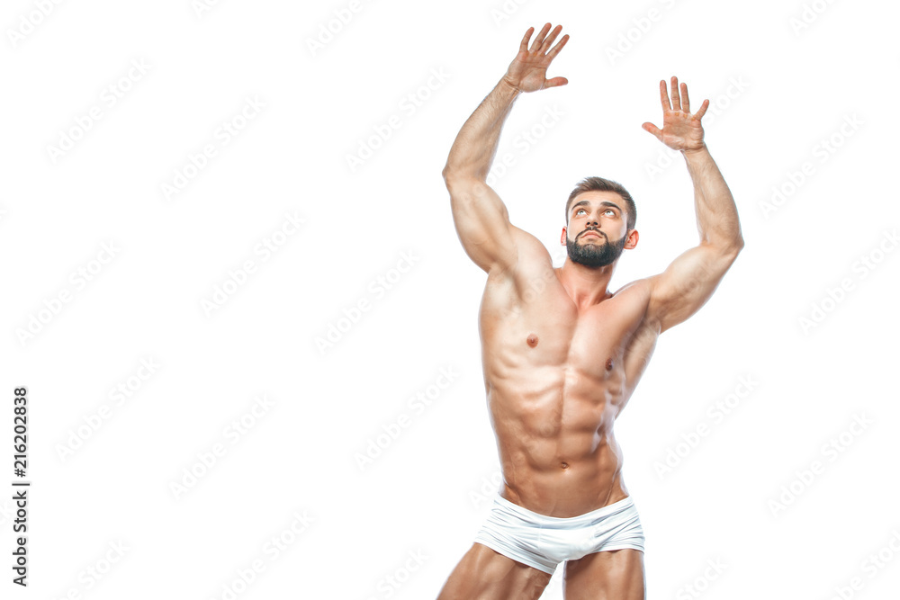 bodybuilder posing. Beautiful sporty guy male power. Fitness muscled manin white lingerie. on isolated white background.