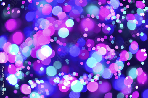 Pink and blue bokeh lights background. 