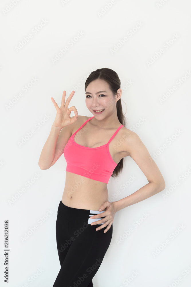portrait of young fitness woman and .exercise