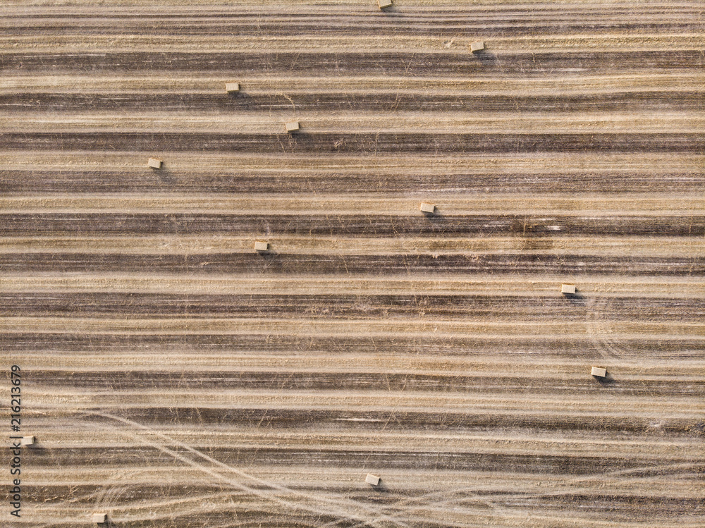 Bales of straw on harvest fields in Czech Republic, aerial view Bales of straw on harvest fields in Czech Republic, aerial view