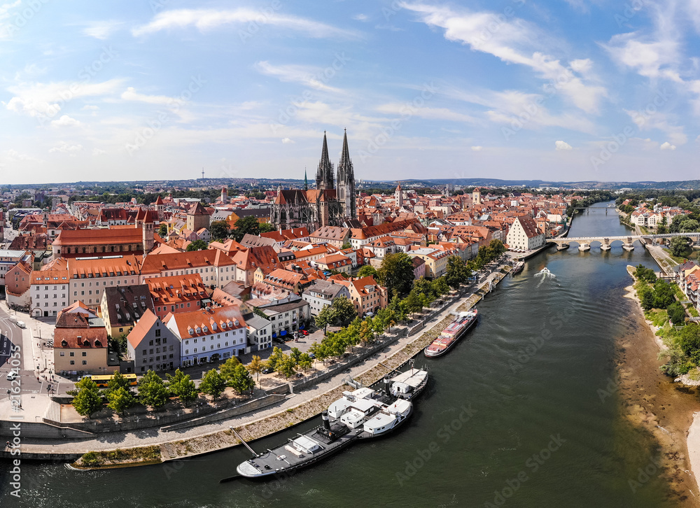 Aerial photography of Regensburg city, Germany. Danube river, architecture, Regensburg Cathedral and Stone Bridge