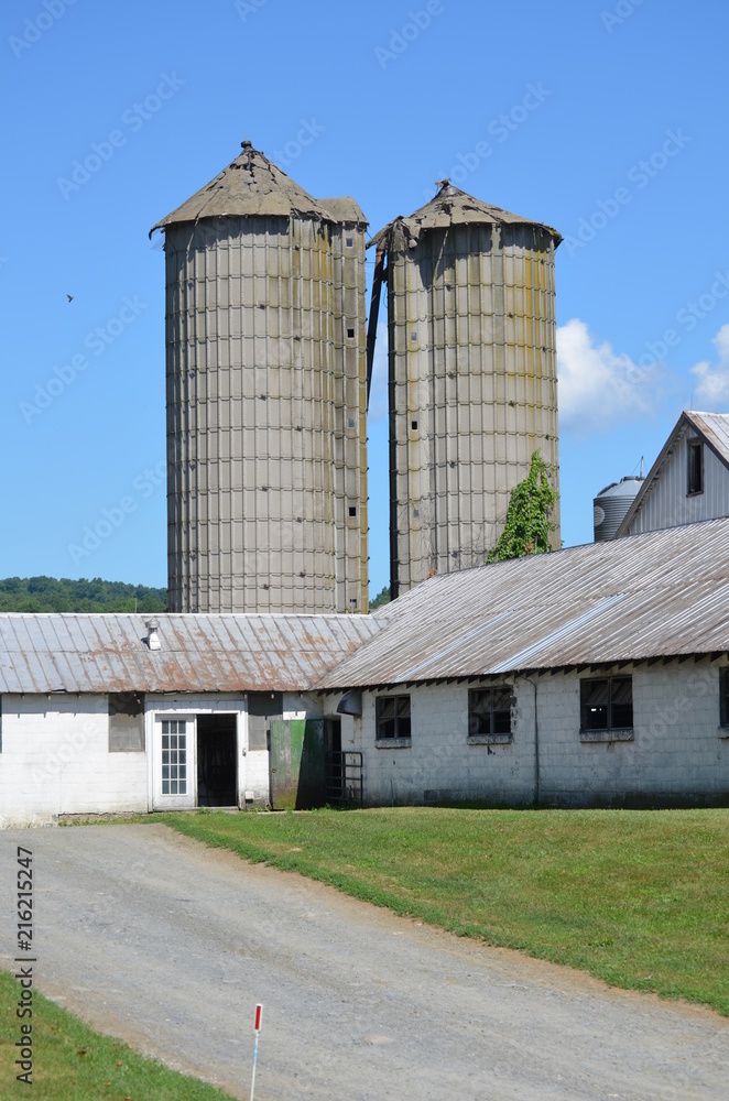 old silos at a milk farm