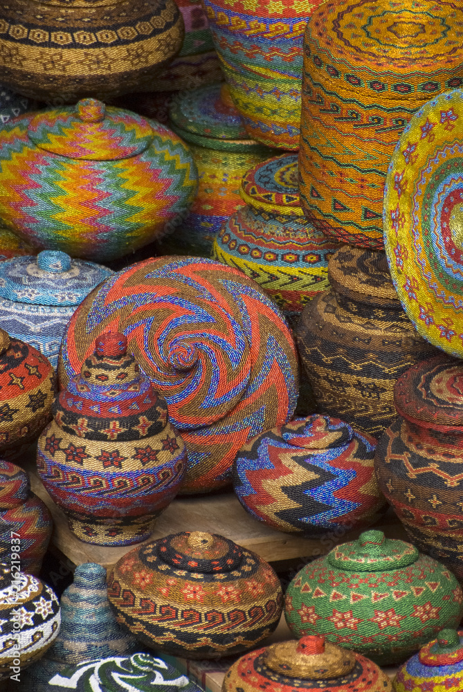 Balinese Beaded Baskets For Sale in Ubud Public Market. Colorful and creative Balinese handicrafts make great souvenirs and are featured here in the Ubud crafts market in central Bali. Balinese Beaded Baskets For Sale in Ubud Public Market. Colorful and creative Balinese handicrafts make great souvenirs and are featured here in the Ubud crafts market in central Bali.