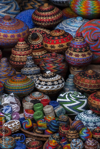 Balinese Beaded Baskets For Sale in Ubud Public Market. Colorful and creative Balinese handicrafts make great souvenirs and are featured here in the Ubud crafts market in central Bali.