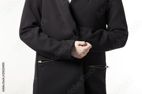 woman wearing black coat isolated white.