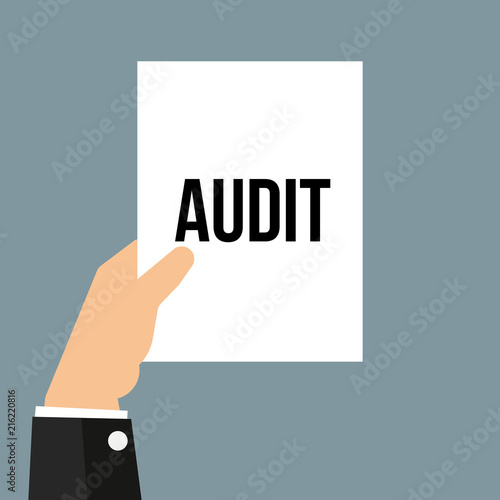 Man showing paper AUDIT text