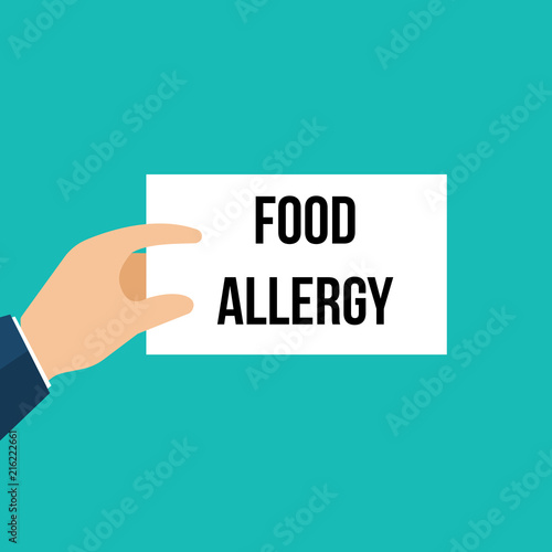 Man showing paper FOOD ALLERGY text
