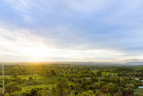 Landscape of cloudy, mountain and forest with sunset in the evening from top view.