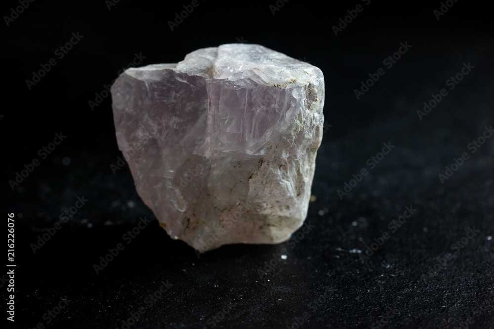fluorite stone mineral crystal sample for science and geology isolate on black background
