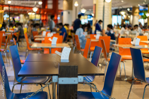 Tables and chairs on food court