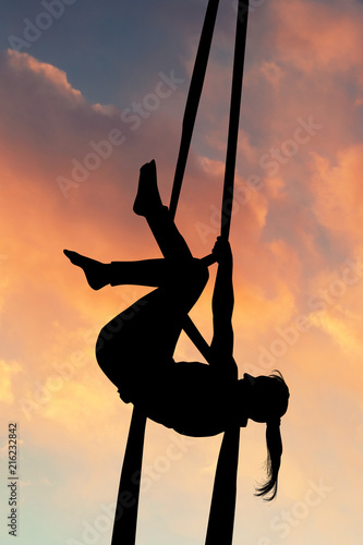 acrobatic aerial at sunset