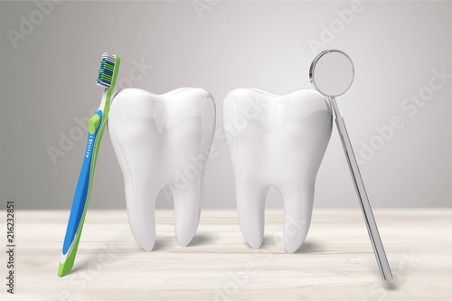 Big teeth  toothbrush and dentist mirror