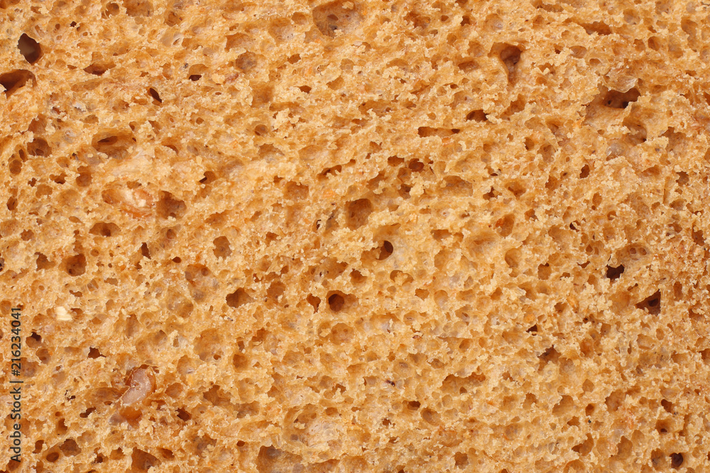 Whole grain bread texture background. macro. top view