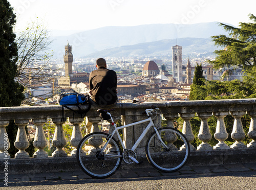 view of Florence with cyclist and bike