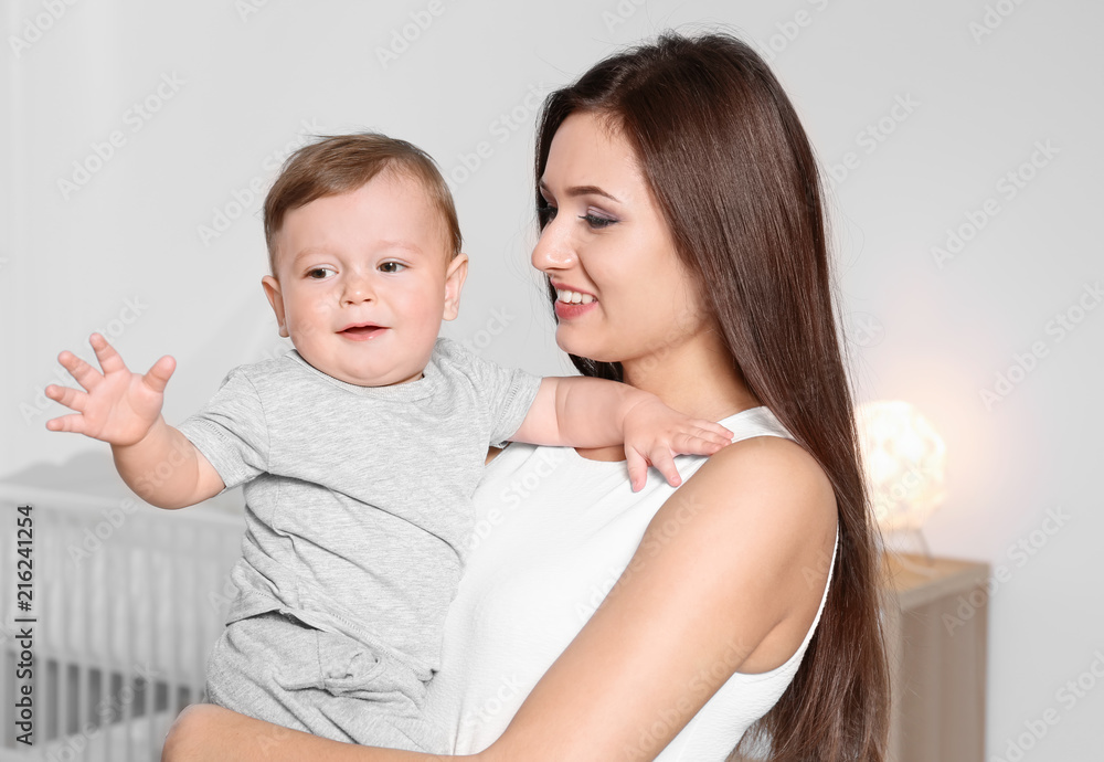 Happy young mother with her cute little baby at home Happy young mother with her cute little baby at home