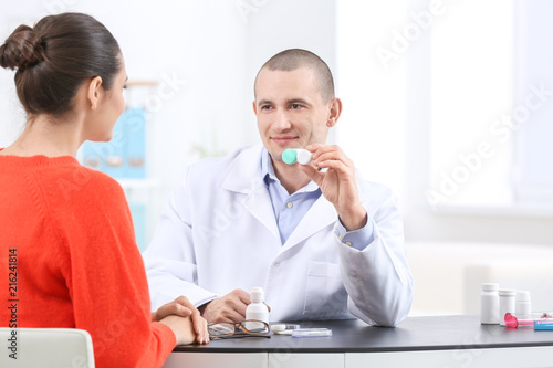 Male doctor showing contact...
