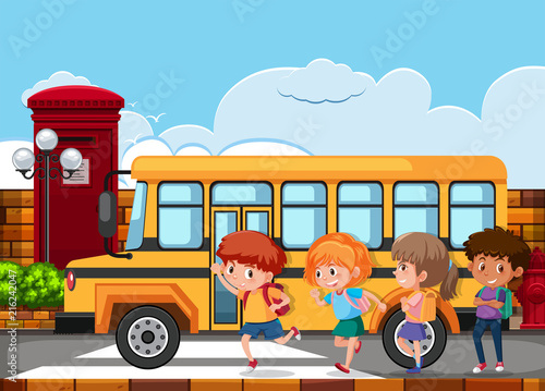 Children running to get on the school bus