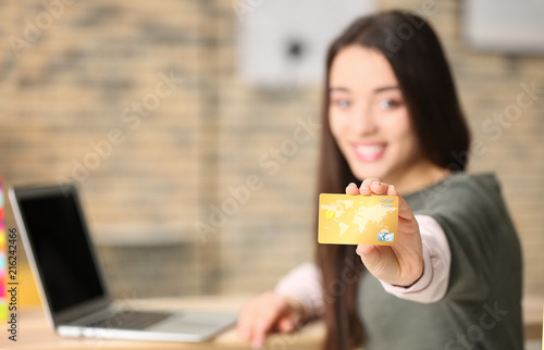 Young woman shopping online...