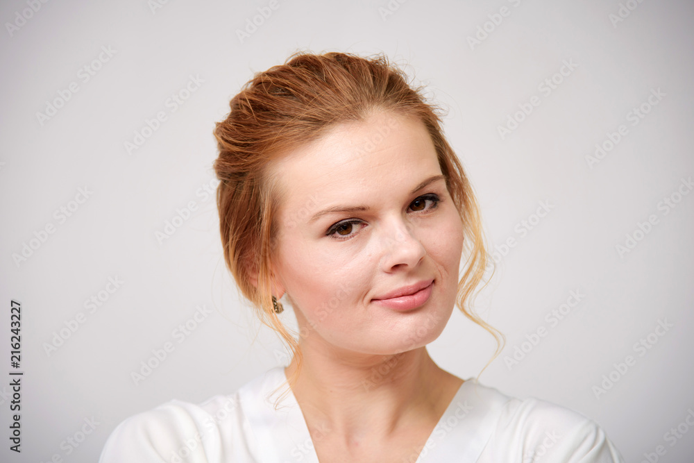 portrait of a beautiful blonde girl on a white background with a beautiful hairdress portrait of a beautiful blonde girl on a white background with a beautiful hairdress