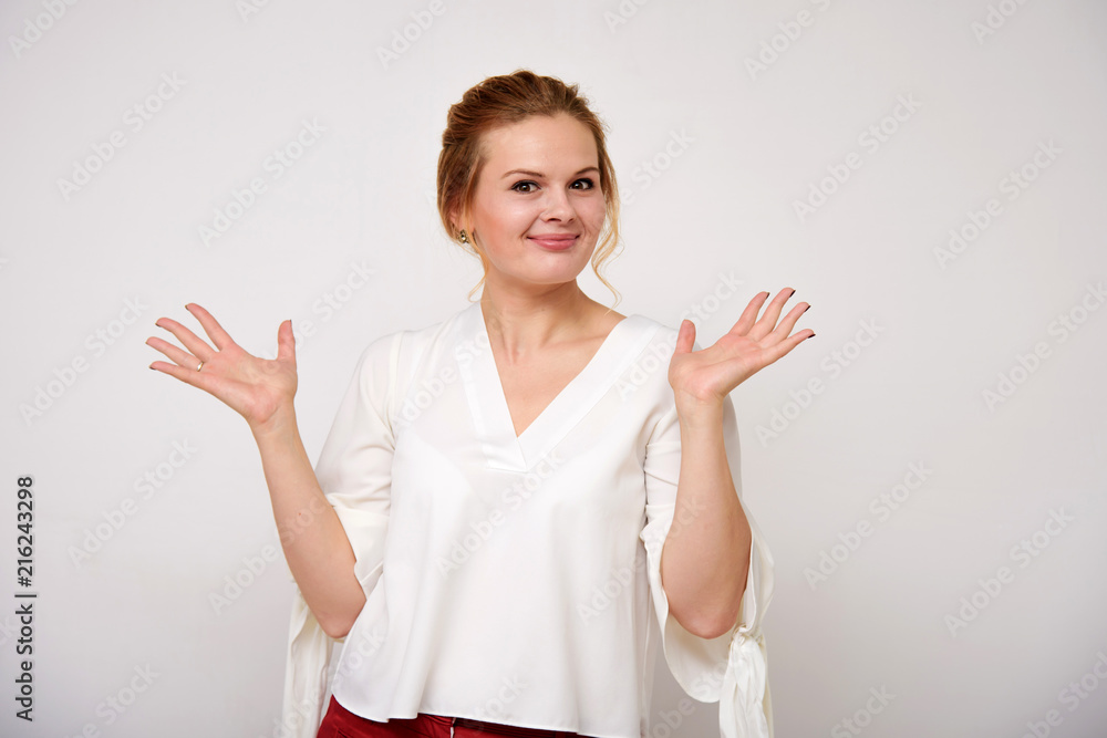 portrait of a beautiful blonde girl on a white background in different poses with different emotions. portrait of a beautiful blonde girl on a white background in different poses with different emotions.