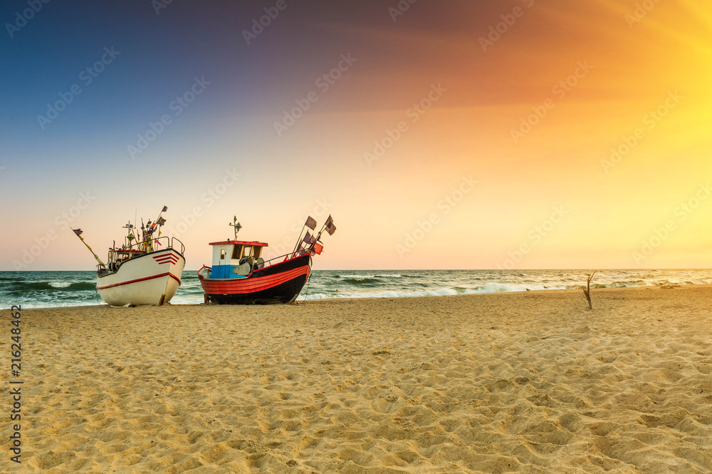 Fishing boat parked on the beach
