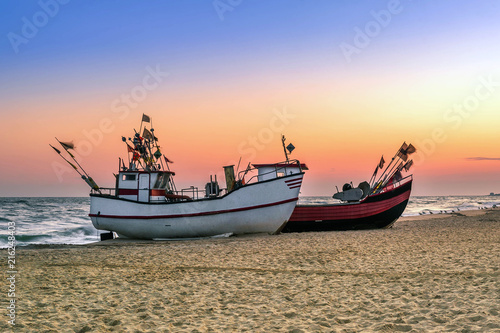 Fishing boat parked on the beach