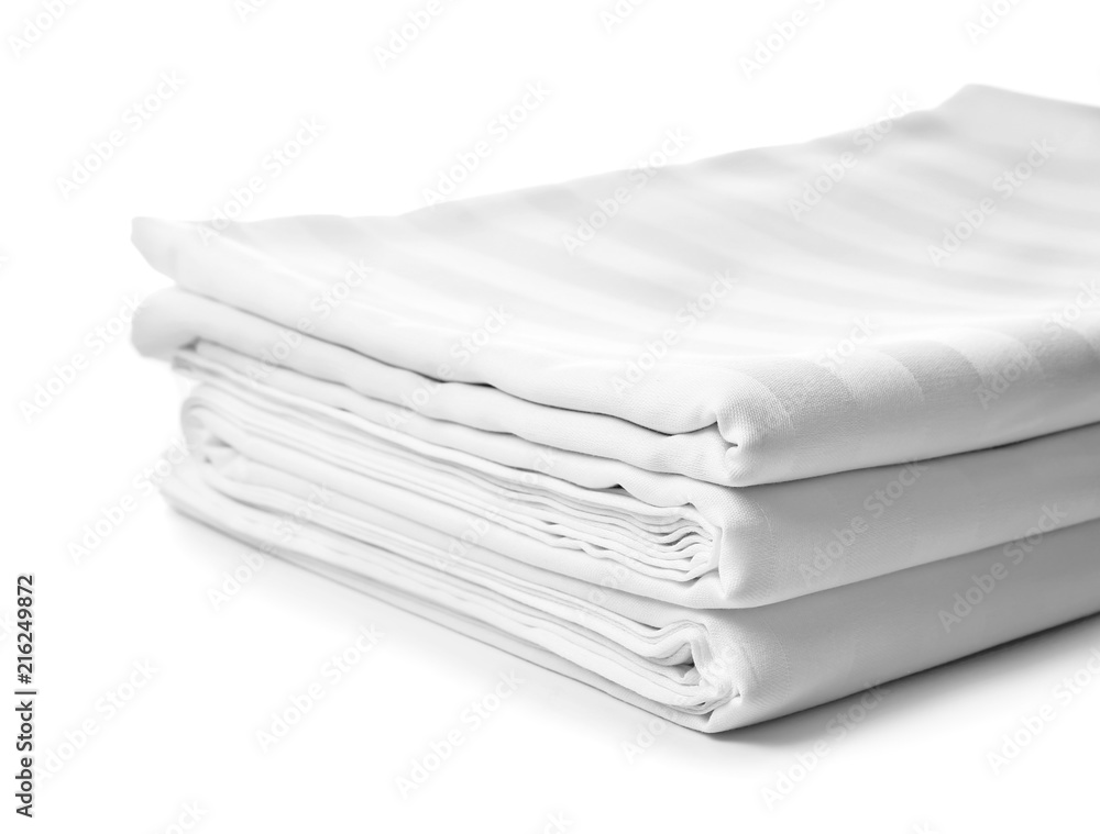 Stack of clean bed sheets on white background Stack of clean bed sheets on white background