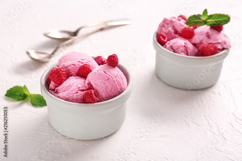 Bowls with tasty raspberry ...