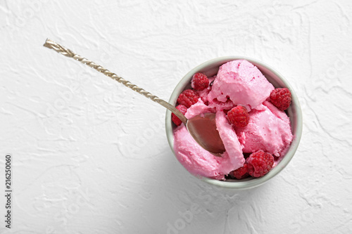 Bowl with tasty raspberry i...
