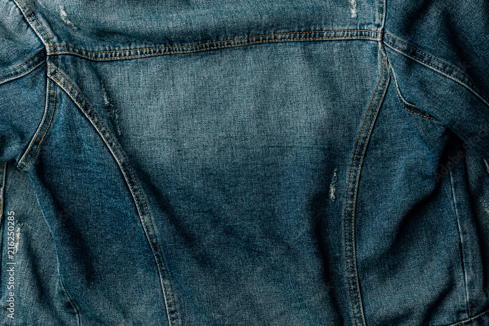 top view of denim textile as background top view of denim textile as background