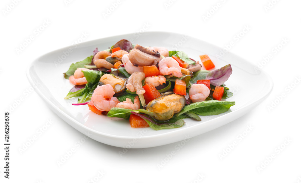 Plate of delicious vegetable salad with seafood on white background Plate of delicious vegetable salad with seafood on white background