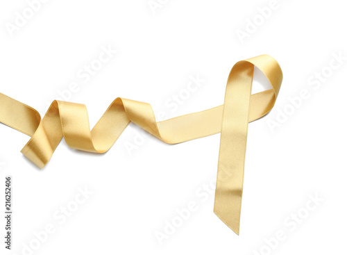 Curled golden ribbon on white background