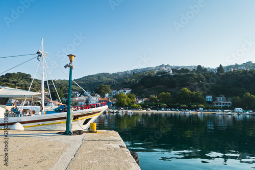 Ships in Loutraki, Glossa harbor at summer morning, Skiathos island, Greece photo