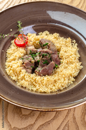 Roasted meat with pearl barley