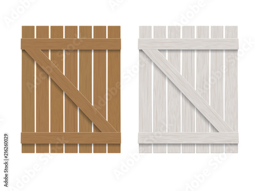 An old wooden wicket. Gate to the rural garden. Element of landscape design of the front garden.