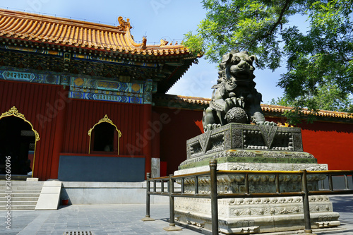 Detail of architecture ,of buddhist temple in china with a statue of dragon