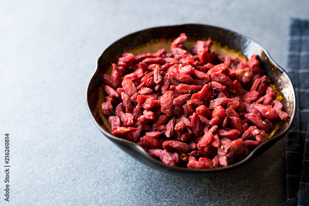 Organic Dried Goji Berries in Ceramic Bowl. Organic Dried Goji Berries in Ceramic Bowl.