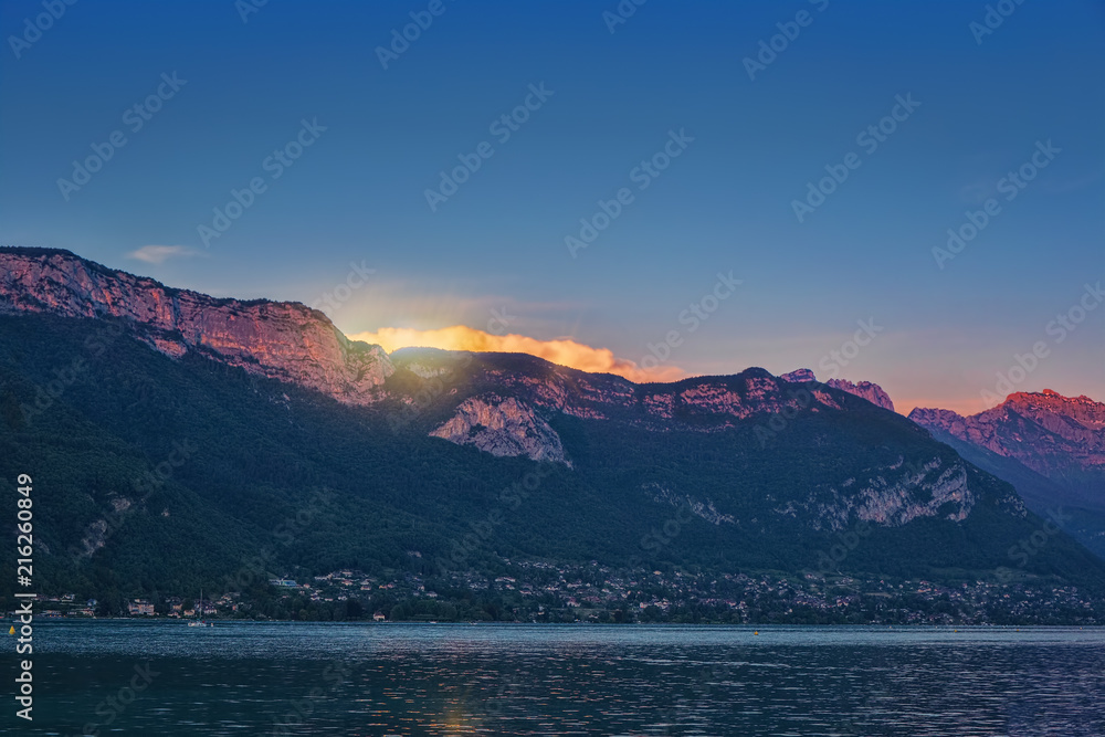 Sunset in the summer in the French resort town of Annecy. Lake Annecy.