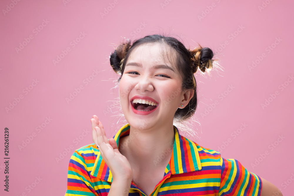 Obraz premium Young pretty asian woman laugh with happiness