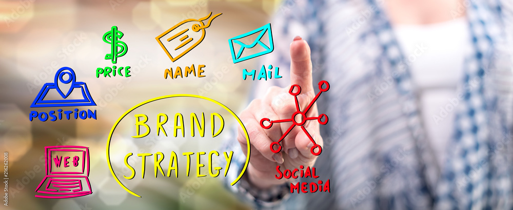 Obraz premium Woman touching a brand strategy concept